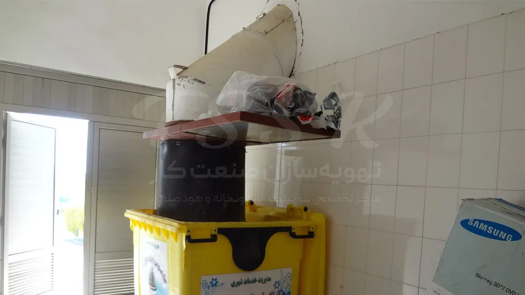 نمای انتهای کانال شوتینگ زباله و مخزن شوتینگ زرد رنگ